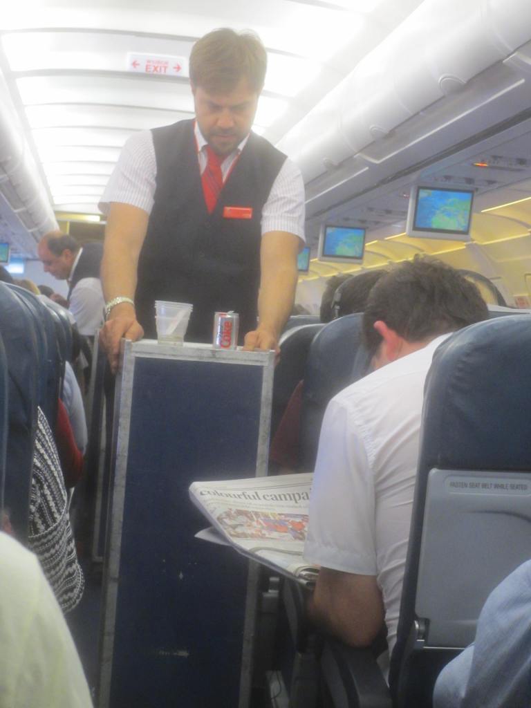 Meal service on Air Malta flight.